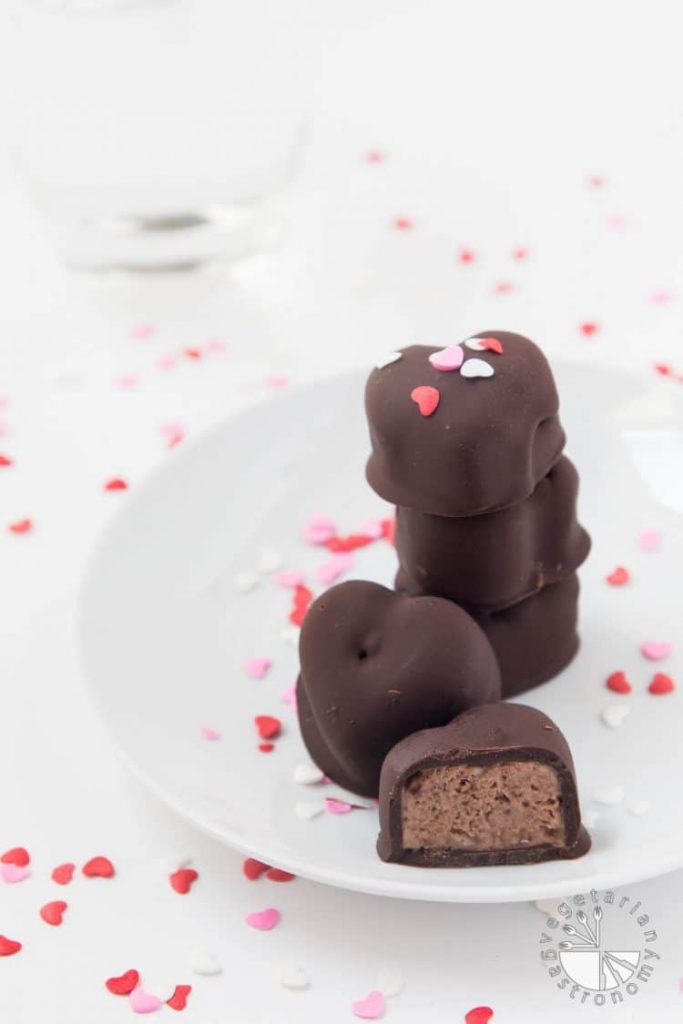 37 Healthy Valentine's Day Recipes: Indulge Without The Bulge 
CHOCOLATE COVERED BANANA-CHOCOLATE ICE CREAM BITES (VEGAN) Heart shaped chocolates on a plate