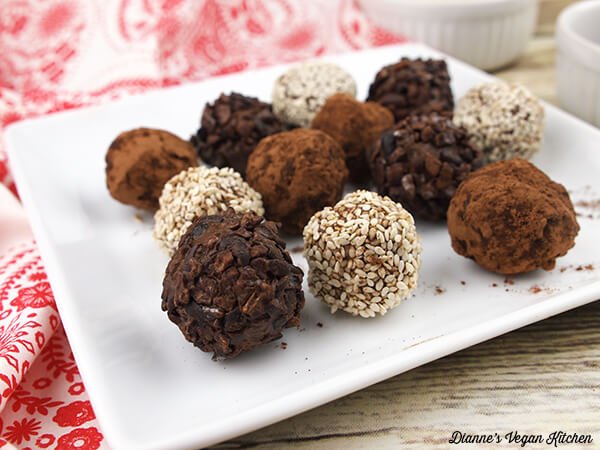 37 Healthy Valentine's Day Recipes: Indulge Without The Bulge VEGAN TAHINI TRUFFLES ON A PLATE