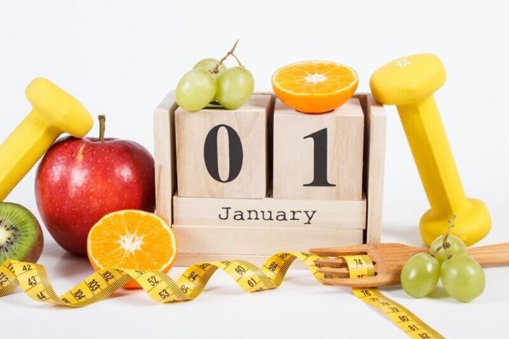 How Much Weight Can You Lose In A Month? (Truthfully)
Cube calendar with date, fruits, dumbbells and tape measure