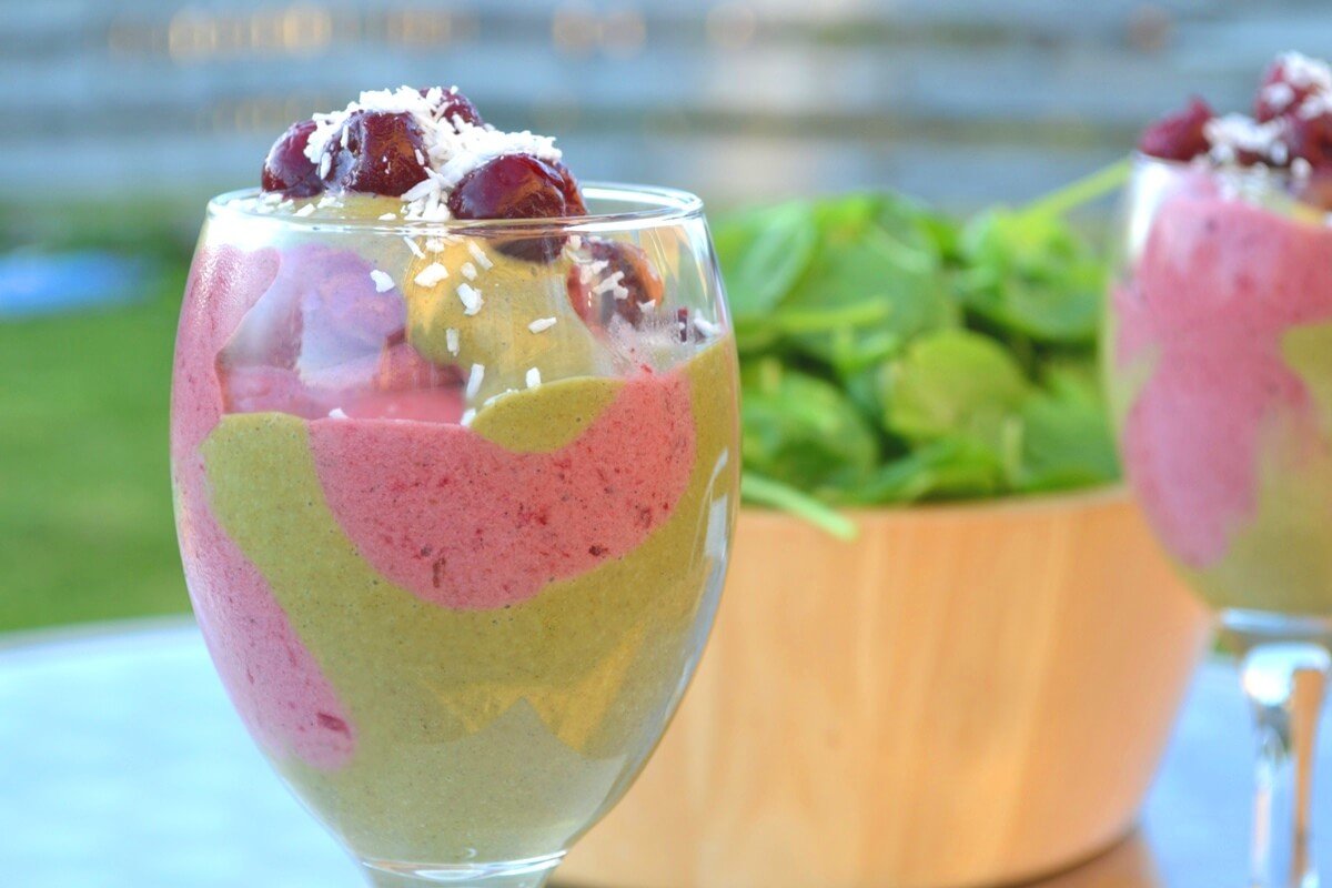 37 Healthy Valentine's Day Recipes: Indulge Without The Bulge
Healthy Cherry & Coconut Hot Fudge Sundae with a Green Twist with spinach in the background