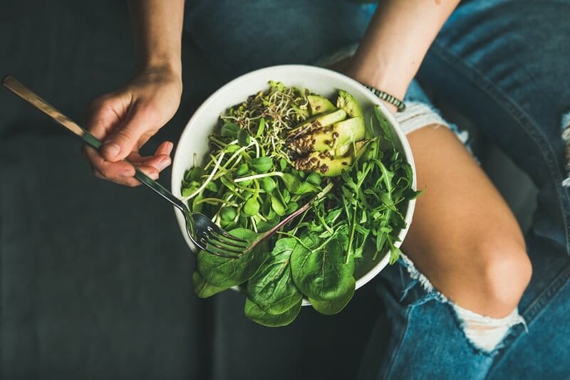 17 Surprising Spinach Nutrition Facts & Health Benefits; Clean eating breakfast with spinach, arugula, avocado, seeds and sprouts