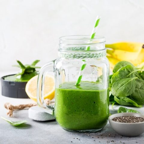 Over 50 Spinach Recipes: The Complete Collection; Healthy green smoothie with spinach in glass jar 2