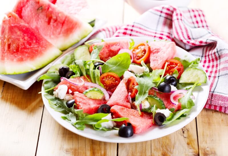 Paleo vs Vegan? Why A Pegan Diet Is Your Best Option; fruit vegetable salad, of leafy greens and watermelon
