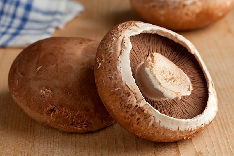 34 High Protein Vegetables You Probably Already Eat; Fresh raw portobello mushrooms