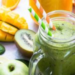 green smoothie in mason jar, mango apple kiwi