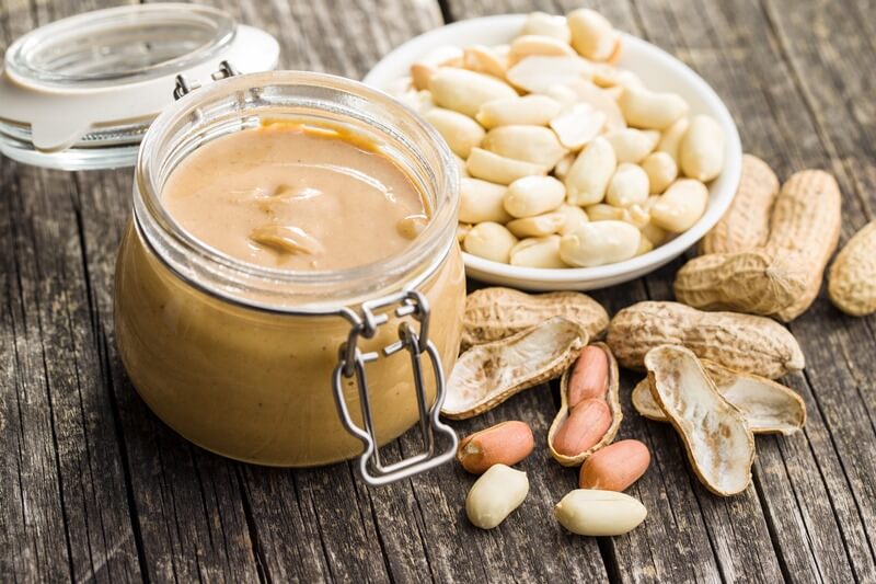 200+ Smoothie Ingredients Shopping List Printable; Peanut butter in jar and peanuts