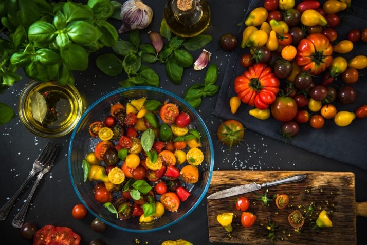 Healthy salad from colorful chopped raw tomatoes