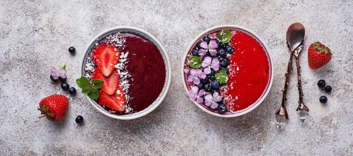 12 Healthy Smoothie Topping Recipes; Smoothie bowls with strawberry and blueberry